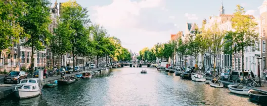 A view of a canal from a bridge in Amsterdam